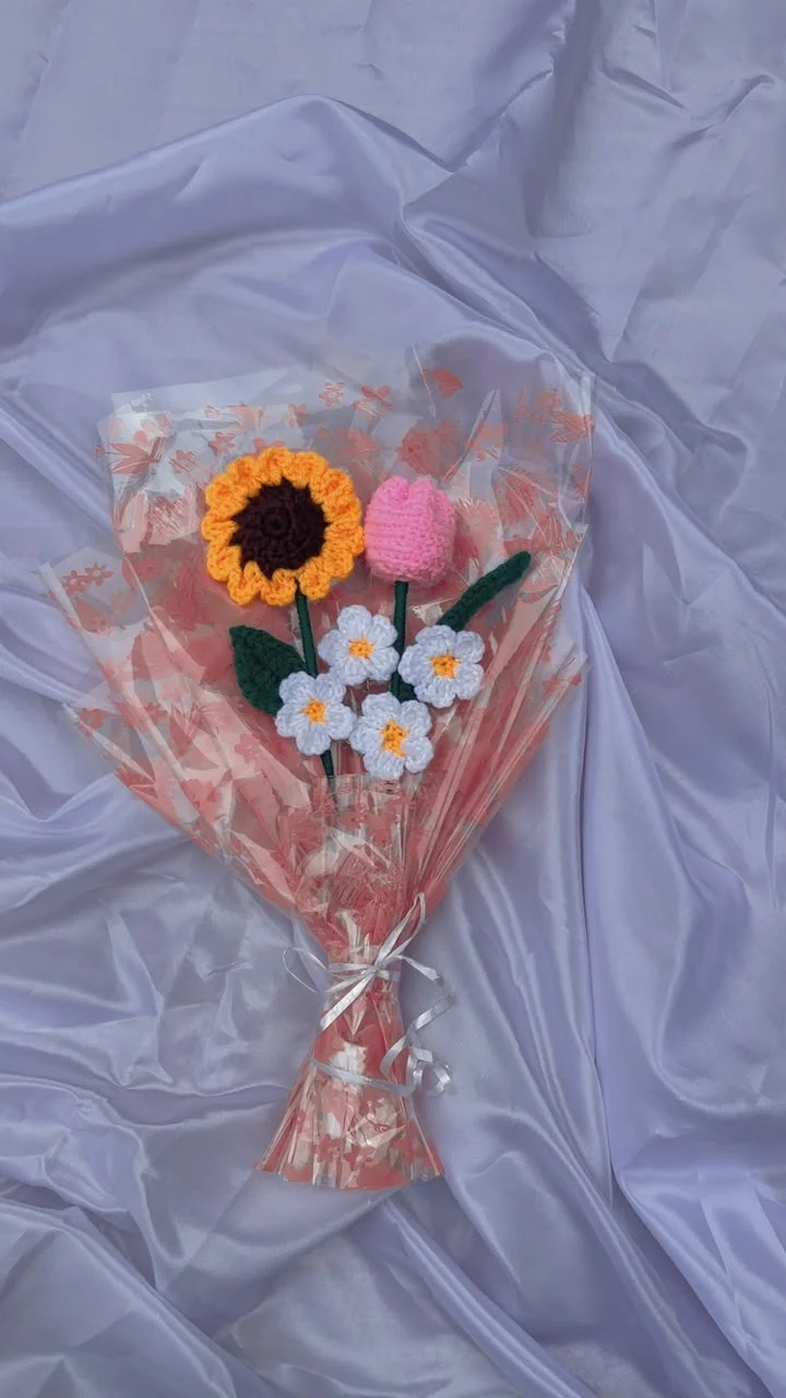 A lovingly wrapped bouquet of handmade crochet flowers